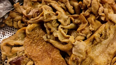 Close Up of Cooked Chicken Feet and Offal at Thai Street Food Market Видео 340351536