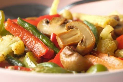 Close up of cooked fresh vegetable on plate Stock Photos