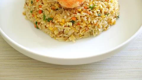 Close-up of cooked fried rice on white plate Stock Photos