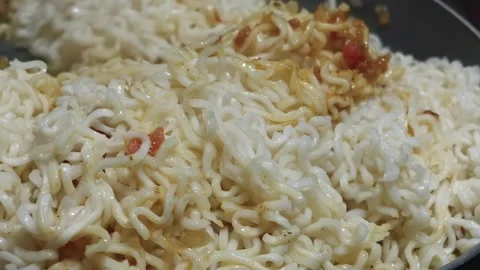 Close-Up of Cooked Instant Noodles Ready to Eat Stock Footage 325525545
