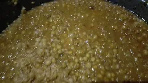 Close-up of cooked lentil soup in a pot video Stock Footage 334944343