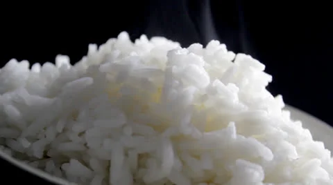 Close up cooked rice steaming Video stock 23142678