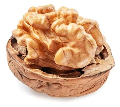 Close-up of cookie with cream and nuts on white background Stock Photos