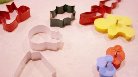 Close up of cookie cutters on a kitchen counter Stock Footage 71037254