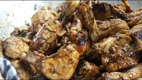 Close up of cooking chicken with sweet soy sauce seasoning Stock Footage 306758534