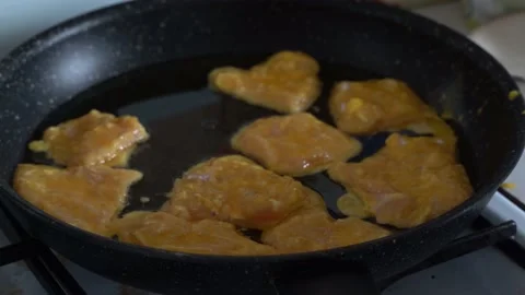 Close up, cooking chops, slicing, chopping, frying at home Stock Footage 131032053