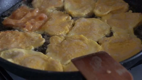Close up, cooking chops, slicing, chopping, frying at home Stock Footage 131032102