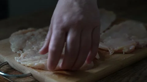 Close up, cooking chops, slicing, chopping, frying at home Stock Footage 131032421