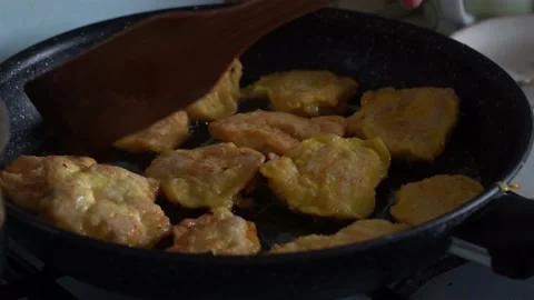 Close up, cooking chops, slicing, chopping, frying at home Stock Footage 131032466
