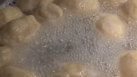 Close up cooking dumplings in a pot Stock Footage 95302995