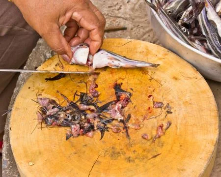 Close up cooking a fish Foto stock