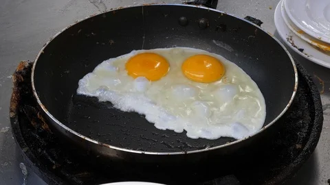 Close up cooking fried egg at pan , healthy concept. Stock-Footage 104437102