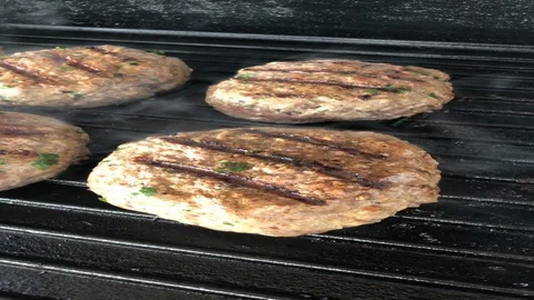 Close up cooking grilled beef meat barbecue burgers for hamburgers Video stock 128845760