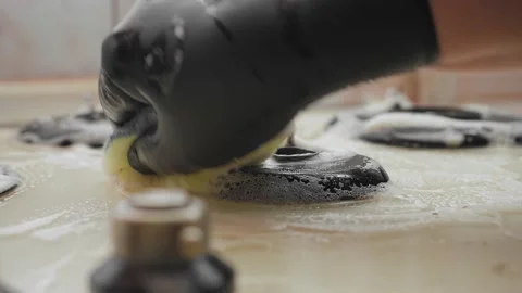 Close-up, the cooking panel washes in gloves with a sponge Video stock 152337218