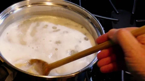 Close Up of cooking pasta being stirred. Stock Footage 336878036