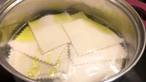 Close up, cooking pasta to make cannelloni Stock Footage 143387185