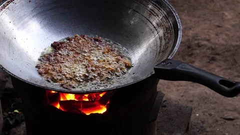 A close-up cooking process by the process of frying Stock Footage 106396349