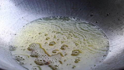 A close-up cooking process by the process of frying Stock Footage 106396497