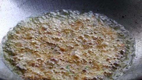 A close-up cooking process by the process of frying Stockbeeldmateriaal 106396520