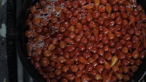 Close Up of Cooking a Sauce of Aromatic Red Chili Stock Footage 129337893