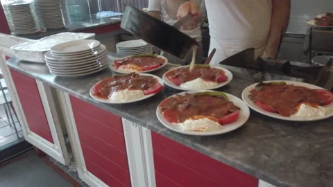 Close Up Of cooks cooking a typical turkish dish in slow motion Stock Footage 159095237
