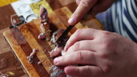 Close up of cooks hands cleaning the fish Stock Footage
