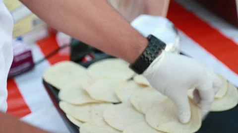 Close-up of cook's hands working with Mexican tortillas Stock Footage 67365969