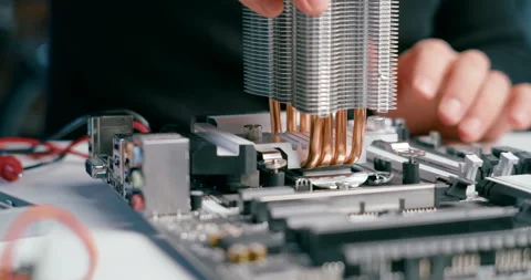 Close up of Cooler Installation on CPU Processor with Thermal Paste in Computer Stock Footage 159510727