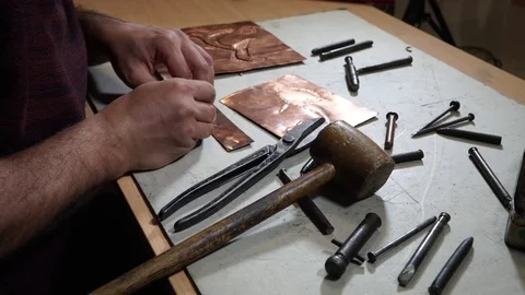Close-up copper-smith work. Art smiting work progress   Stock Footage 82623534
