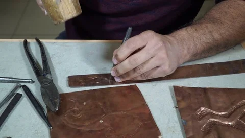 Close-up copper-smith work. Art smiting work progress   Stock Footage 82623609