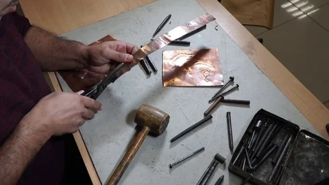Close-up copper-smith work. Art smiting work progress   Stock Footage 82623735