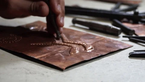 Close-up copper-smith work. Art smiting work progress   Stock Footage 82623969