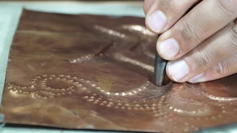 Close-up copper-smith work. Art smiting work progress   Stock Footage 82624047