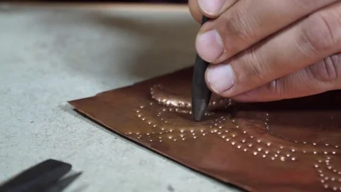 Close-up copper-smith work. Art smiting work progress   Stock Footage 82624051