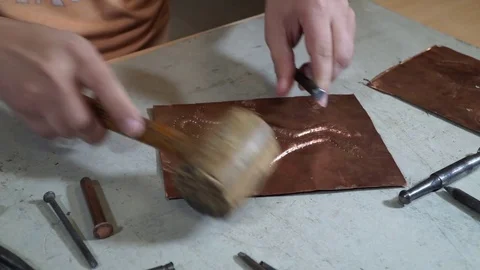 Close-up copper-smith work. Art smiting work progress   Stock Footage 82628875