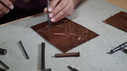 Close-up copper-smith work. Art smiting work progress   Stock Footage 82628944