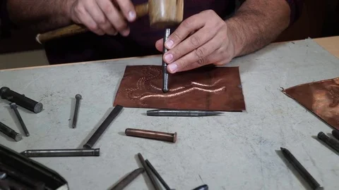 Close-up copper-smith work. Art smiting work progress   Stock Footage 82628976