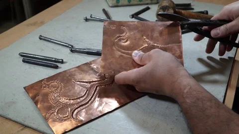 Close-up copper-smith work. Art smiting work progress   Stock Footage 82628997