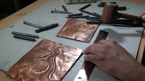 Close-up copper-smith work. Art smiting work progress   Stock Footage 82629028
