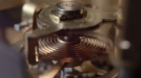Close up of a copper spiral from a internal watch mechanism Stock Footage 46118027
