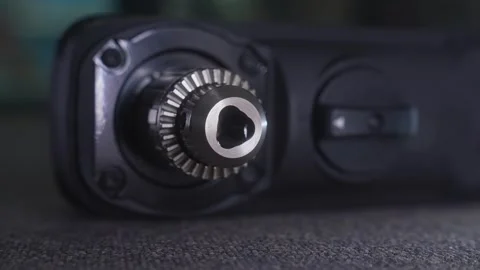 Close Up of a Cordless Drill Chuck on Carpet 動画素材 329615694