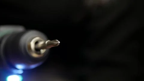 Close-up of cordless screwdriver. Torx screwdriver bit rotates at speed. Stock Footage 303690167