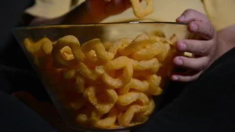 Close up of corn rings in a glass bowl 스톡 동영상 337069545
