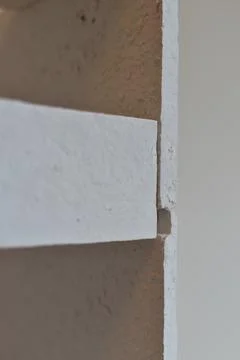 Close up of a corner joint showcasing clean lines and texture of Stock Photos