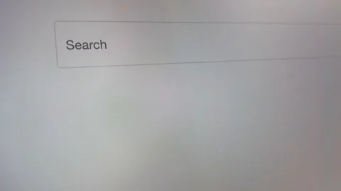 Close up coronavirus typing in searchbar of browser, searching information about Video stock 123744716