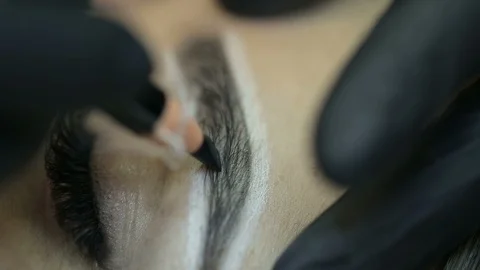 Close up of cosmetologist making microblading procedure. Stock Footage 87406175