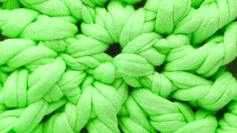 Close up of cotton thread knitting, rotation in circle. Stock Footage 232898458