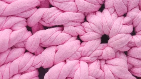 Close up of cotton thread knitting, rotation in circle. Stock Footage 232898538