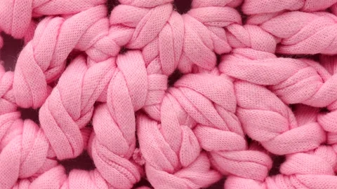 Close up of cotton thread knitting, rotation in circle Stock Footage 234119719