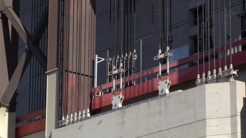 Close up at the counterweights and container with steal cables of the Stock Footage 100743420